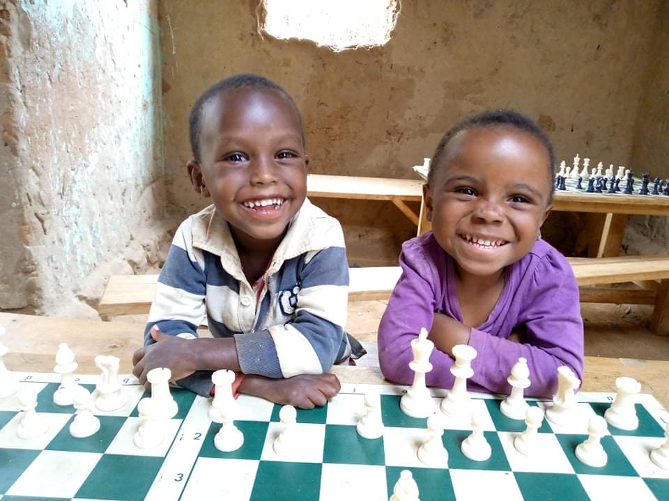 Former sponsored student uses chess and football to improve psychosocial support for children in Nakivale